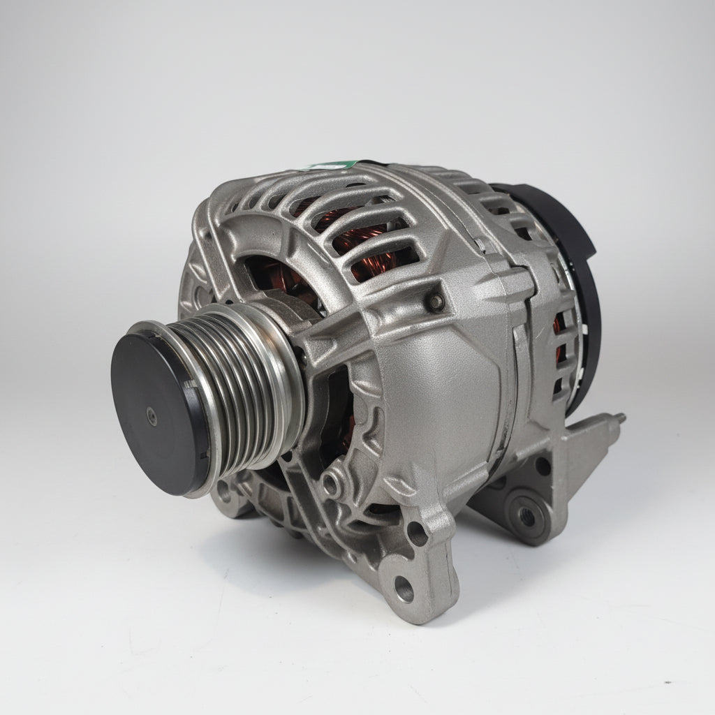 A Remanufactured automotive alternator with a ribbed silver metal housing, a black pulley on the front, and internal copper windings visible through the cooling fins, photographed on a white surface.